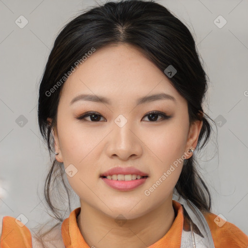 Joyful asian young-adult female with medium  black hair and brown eyes