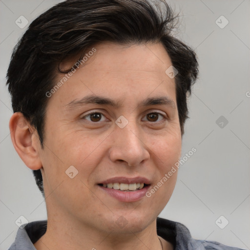 Joyful white adult male with medium  brown hair and brown eyes