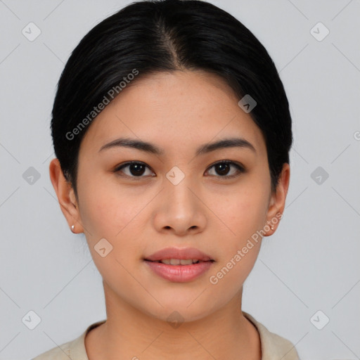 Joyful asian young-adult female with short  brown hair and brown eyes