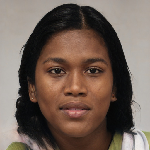 Joyful black young-adult female with medium  black hair and brown eyes