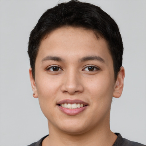 Joyful white young-adult female with short  black hair and brown eyes