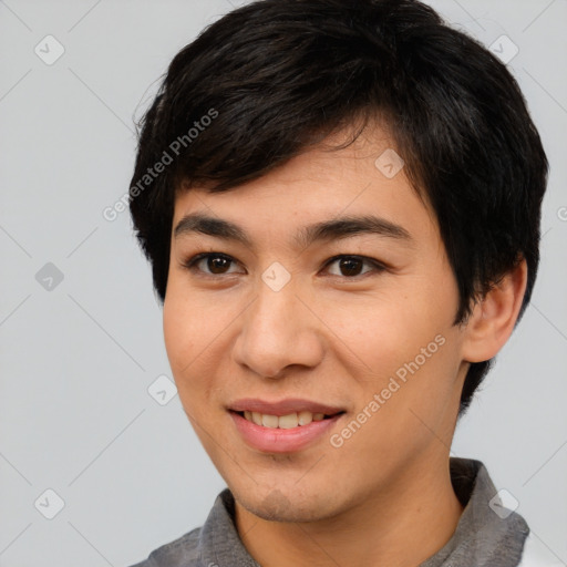 Joyful asian young-adult male with short  black hair and brown eyes