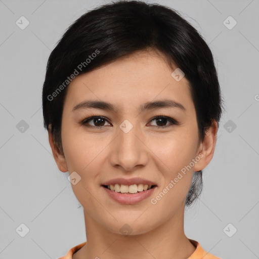 Joyful asian young-adult female with short  black hair and brown eyes