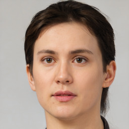 Neutral white young-adult female with short  brown hair and brown eyes