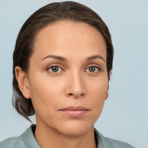 Neutral white young-adult female with medium  brown hair and brown eyes