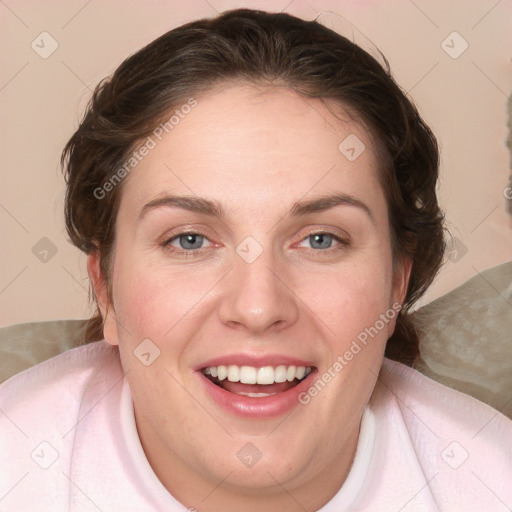 Joyful white young-adult female with medium  brown hair and blue eyes