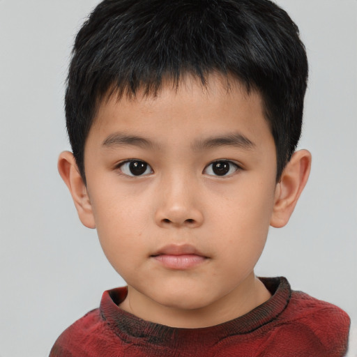Neutral asian child male with short  brown hair and brown eyes