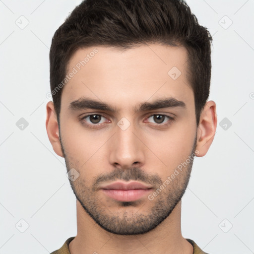 Neutral white young-adult male with short  brown hair and brown eyes