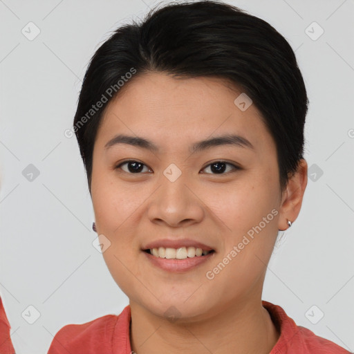 Joyful asian young-adult female with short  brown hair and brown eyes