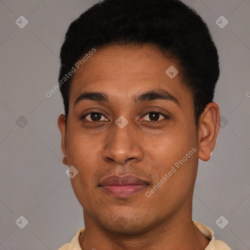 Joyful black young-adult male with short  black hair and brown eyes