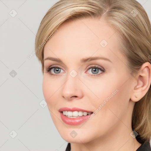 Joyful white young-adult female with long  brown hair and blue eyes