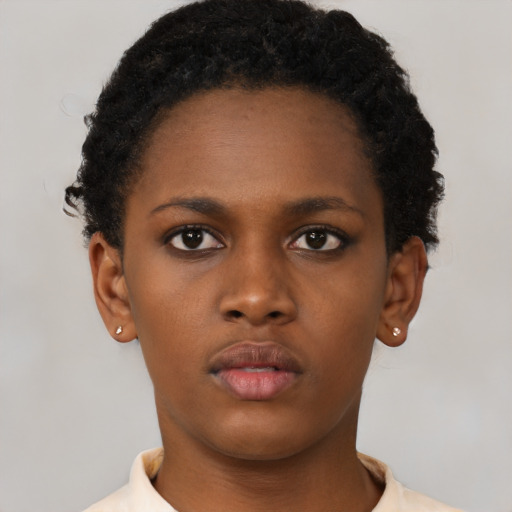 Neutral black young-adult female with short  brown hair and brown eyes