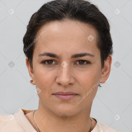 Joyful white young-adult female with short  brown hair and brown eyes