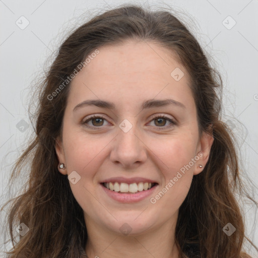 Joyful white young-adult female with long  brown hair and grey eyes