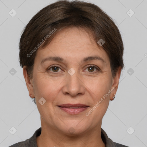 Joyful white adult female with short  brown hair and brown eyes