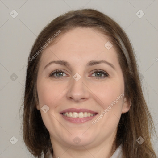 Joyful white young-adult female with long  brown hair and grey eyes