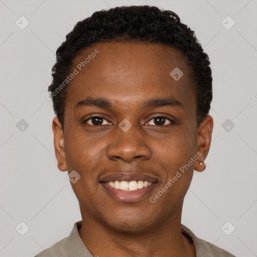Joyful black young-adult male with short  black hair and brown eyes