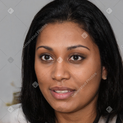 Joyful latino young-adult female with long  brown hair and brown eyes