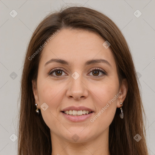 Joyful white young-adult female with long  brown hair and brown eyes