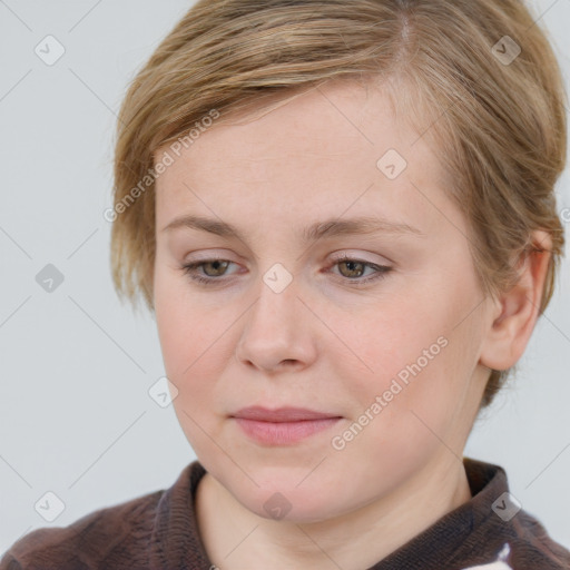 Joyful white young-adult female with medium  brown hair and blue eyes