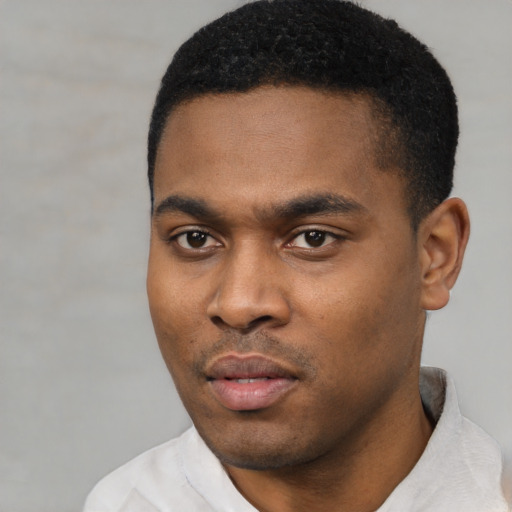 Neutral latino young-adult male with short  black hair and brown eyes