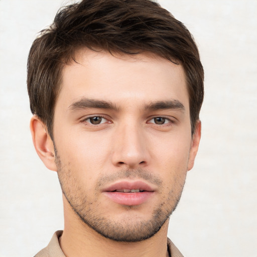 Neutral white young-adult male with short  brown hair and brown eyes