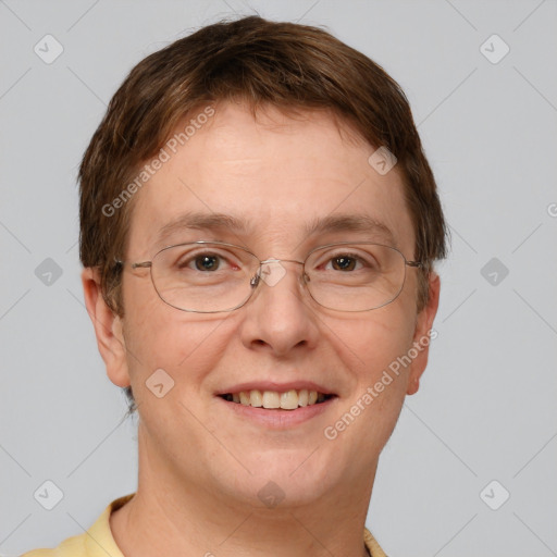 Joyful white adult male with short  brown hair and grey eyes