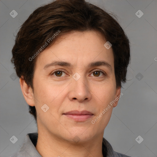 Joyful white adult female with short  brown hair and brown eyes