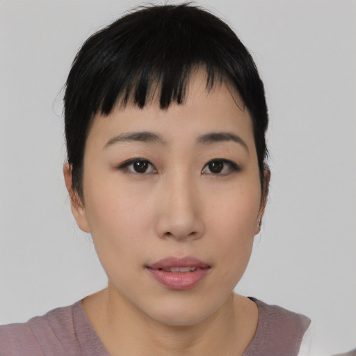 Neutral asian young-adult female with medium  black hair and brown eyes