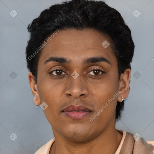 Joyful latino young-adult female with short  brown hair and brown eyes