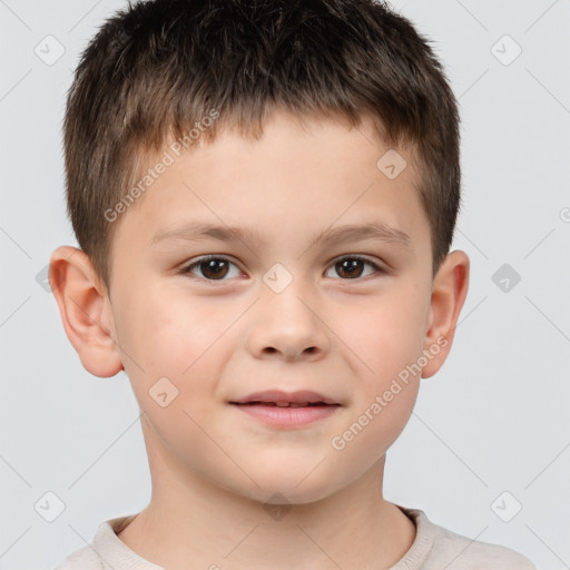 Joyful white child male with short  brown hair and brown eyes