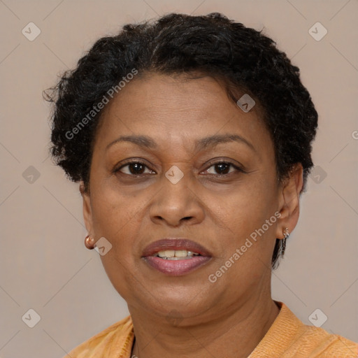 Joyful latino adult female with short  brown hair and brown eyes