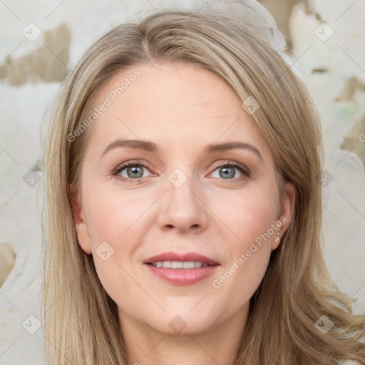 Joyful white adult female with long  brown hair and grey eyes