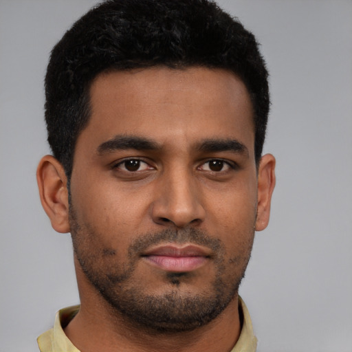 Neutral black young-adult male with short  brown hair and brown eyes
