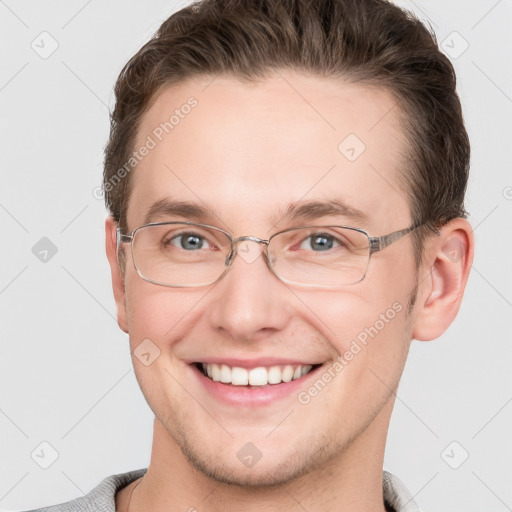 Joyful white adult male with short  brown hair and grey eyes