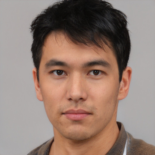 Neutral asian young-adult male with short  brown hair and brown eyes