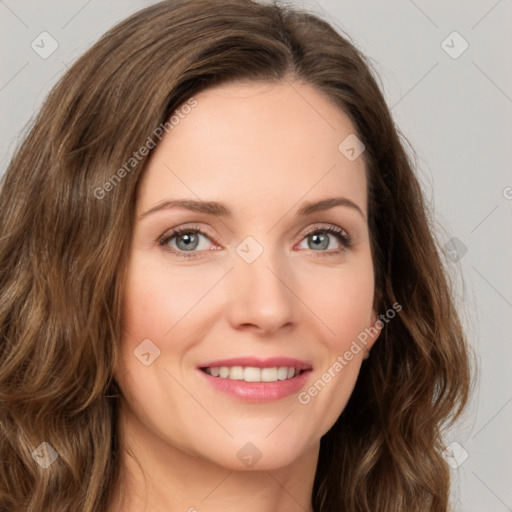 Joyful white young-adult female with long  brown hair and green eyes