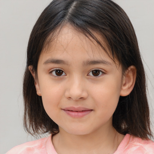 Joyful white child female with medium  brown hair and brown eyes