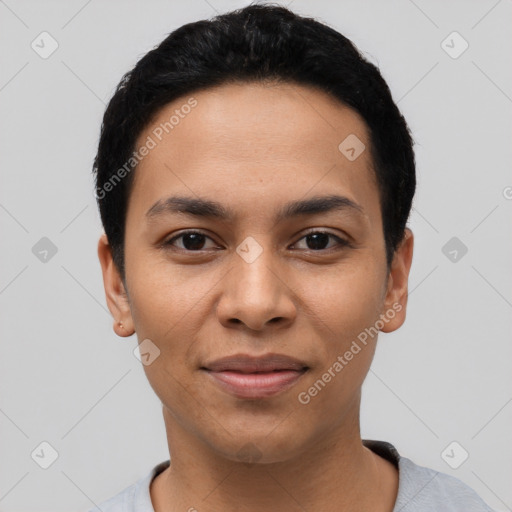 Joyful latino young-adult female with short  black hair and brown eyes