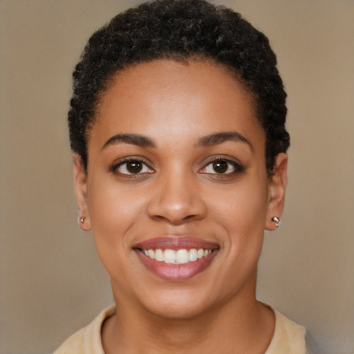 Joyful latino young-adult female with short  brown hair and brown eyes