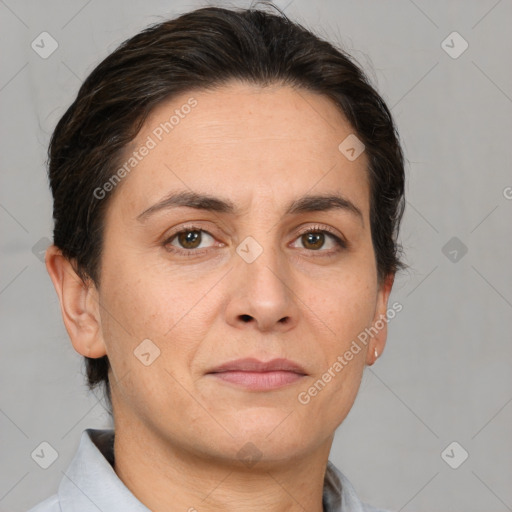 Joyful white adult female with short  brown hair and brown eyes