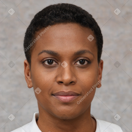 Joyful black young-adult female with short  black hair and brown eyes