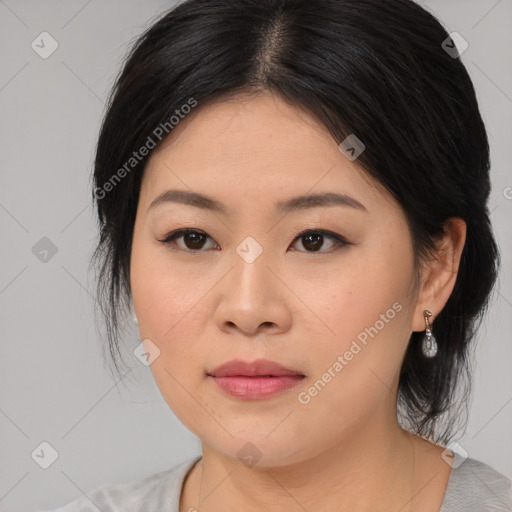 Joyful asian young-adult female with medium  brown hair and brown eyes