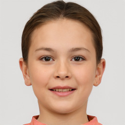 Joyful white child female with short  brown hair and brown eyes