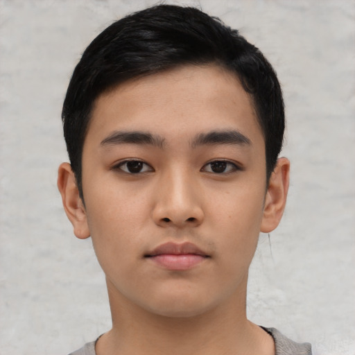 Neutral asian young-adult male with short  black hair and brown eyes
