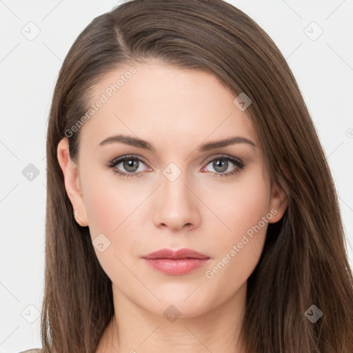 Neutral white young-adult female with long  brown hair and brown eyes