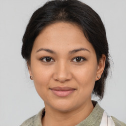 Joyful asian young-adult female with medium  brown hair and brown eyes