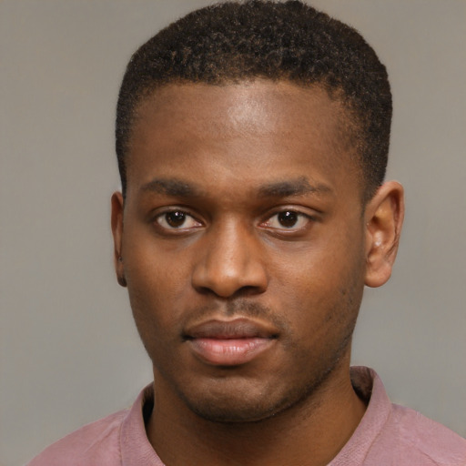 Neutral latino young-adult male with short  brown hair and brown eyes