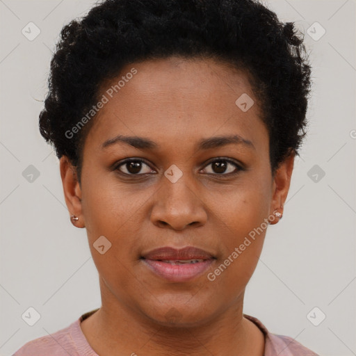 Joyful black young-adult female with short  black hair and brown eyes