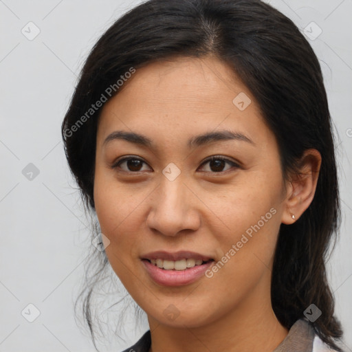 Joyful asian young-adult female with medium  brown hair and brown eyes